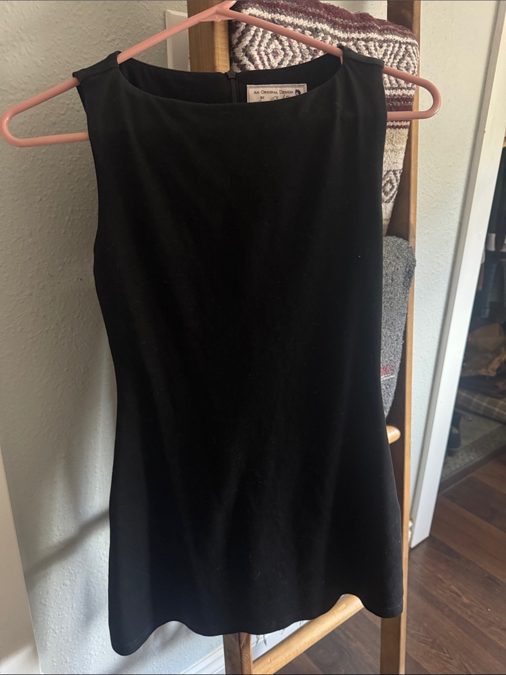 Classic Black Sleeveless Mini Dress by An Original Design